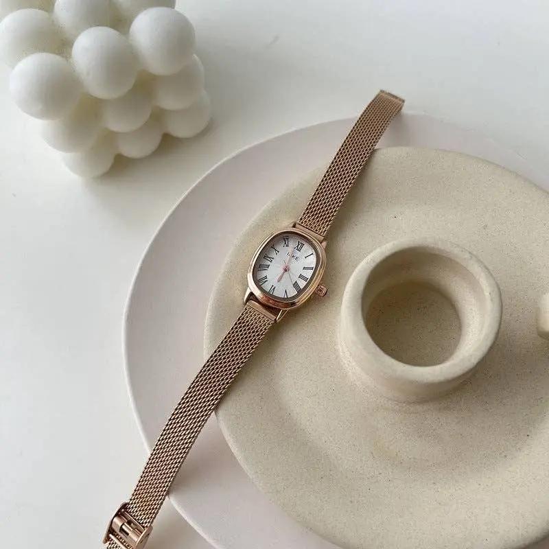 Vintage Oval Slim Strap Roman Numeral Gold Watch - Beloved Boutique